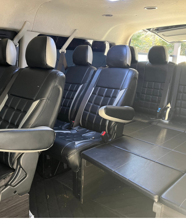 Interior view of a private tour vehicle used for Mt. Fuji photo tours, showing clean and comfortable seating.