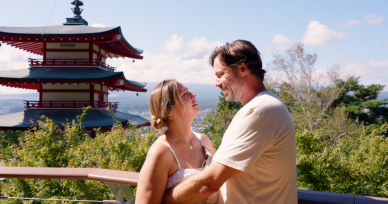 Couple posing at Chureito Pagoda with Mt. Fuji in the background, creating a romantic and scenic memory.