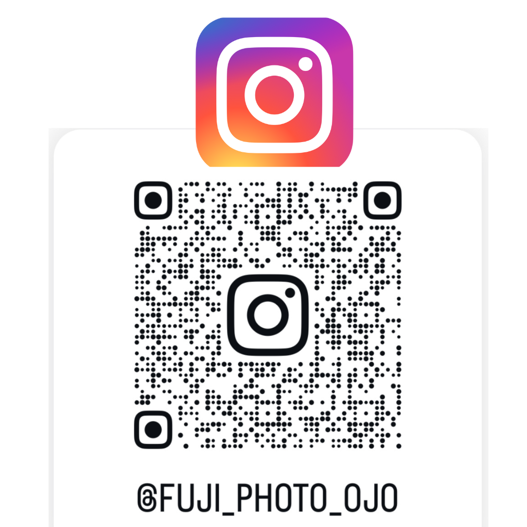 QR code for Fuji Photo Tour booking displayed on a brochure or sign.