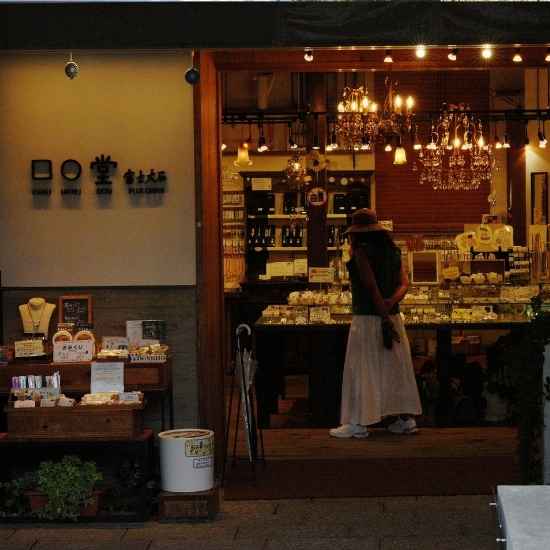 A charming vintage storefront with warm lights and local goods near Mt. Fuji.